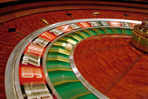Professional live dealer at roulette table